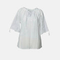 White blouse with ruffled sleeves on a white background
