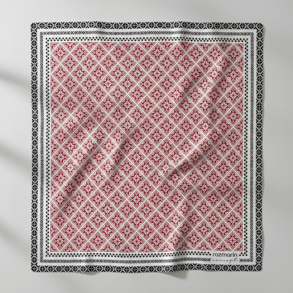 Red and white geometric patterned product with black border on a white background