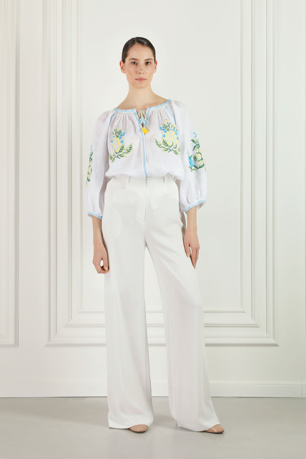 Embroidered white linen blouse with floral cross-stitch Evelyn