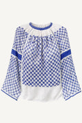 Blue and white checkered Romanian  blouse with bell sleeves on 