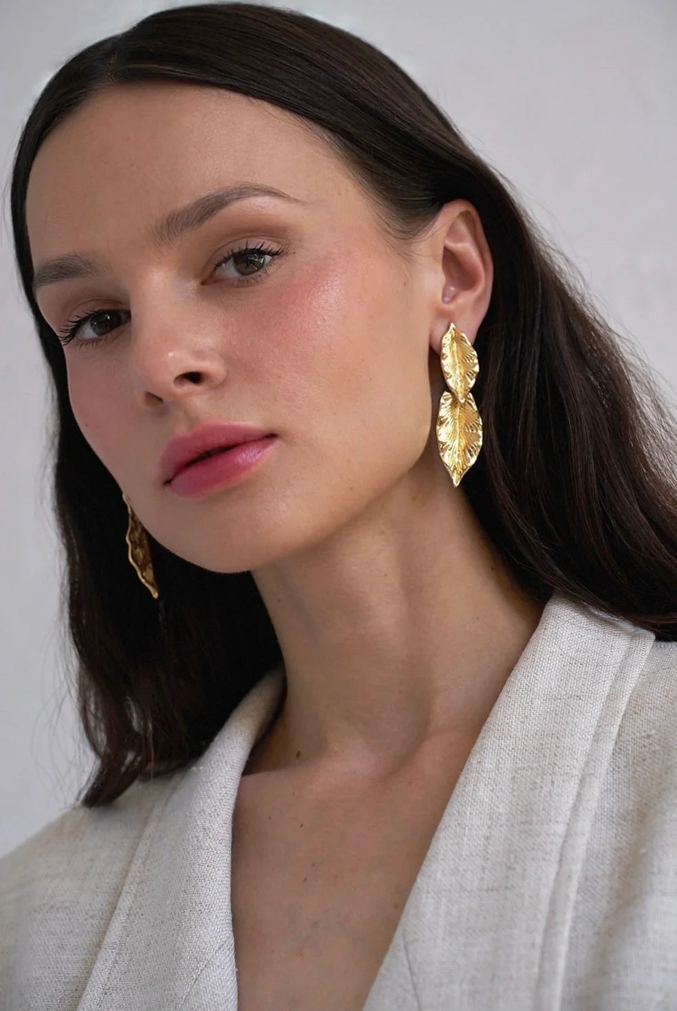 Gold leaf-shaped earrings