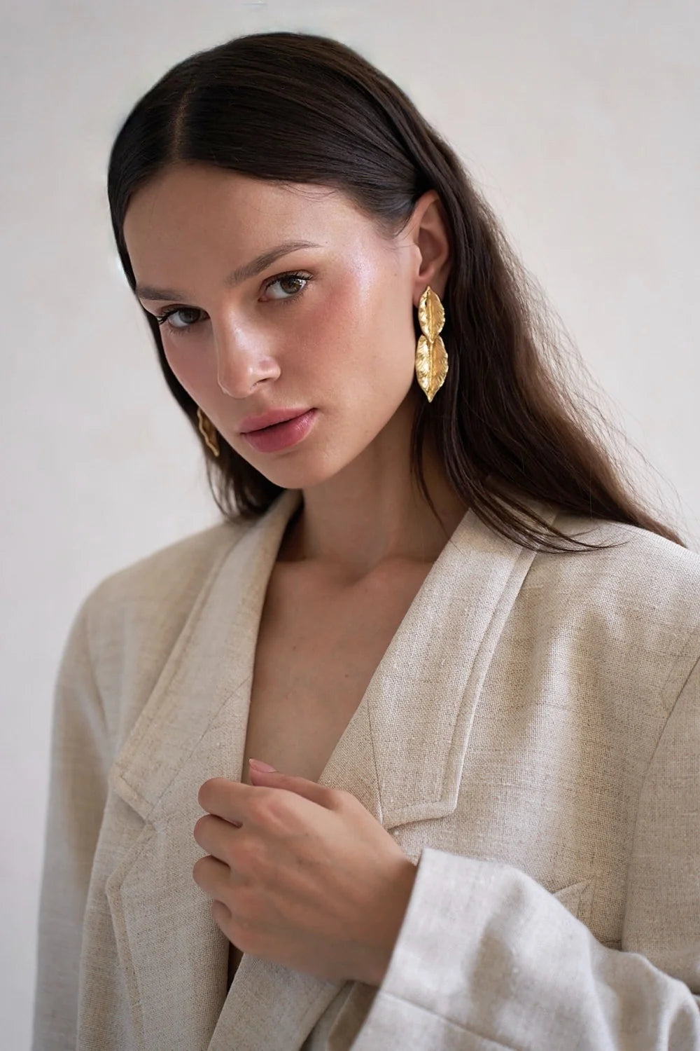 Gold leaf-shaped earrings