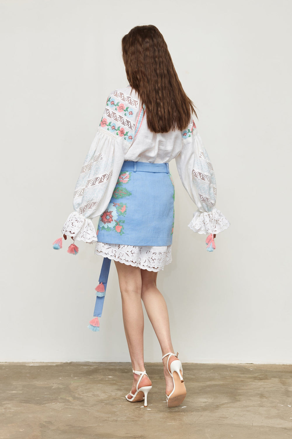 Hand-embroidered folk linen skirt with Richelieu cutwork – openwork detail