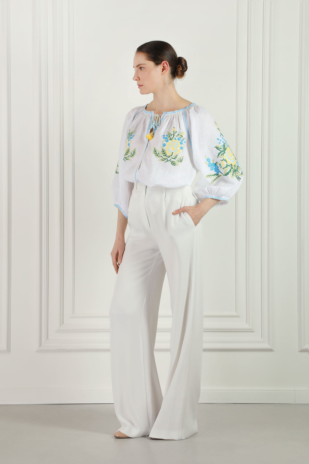 Embroidered white linen blouse with floral cross-stitch Evelyn