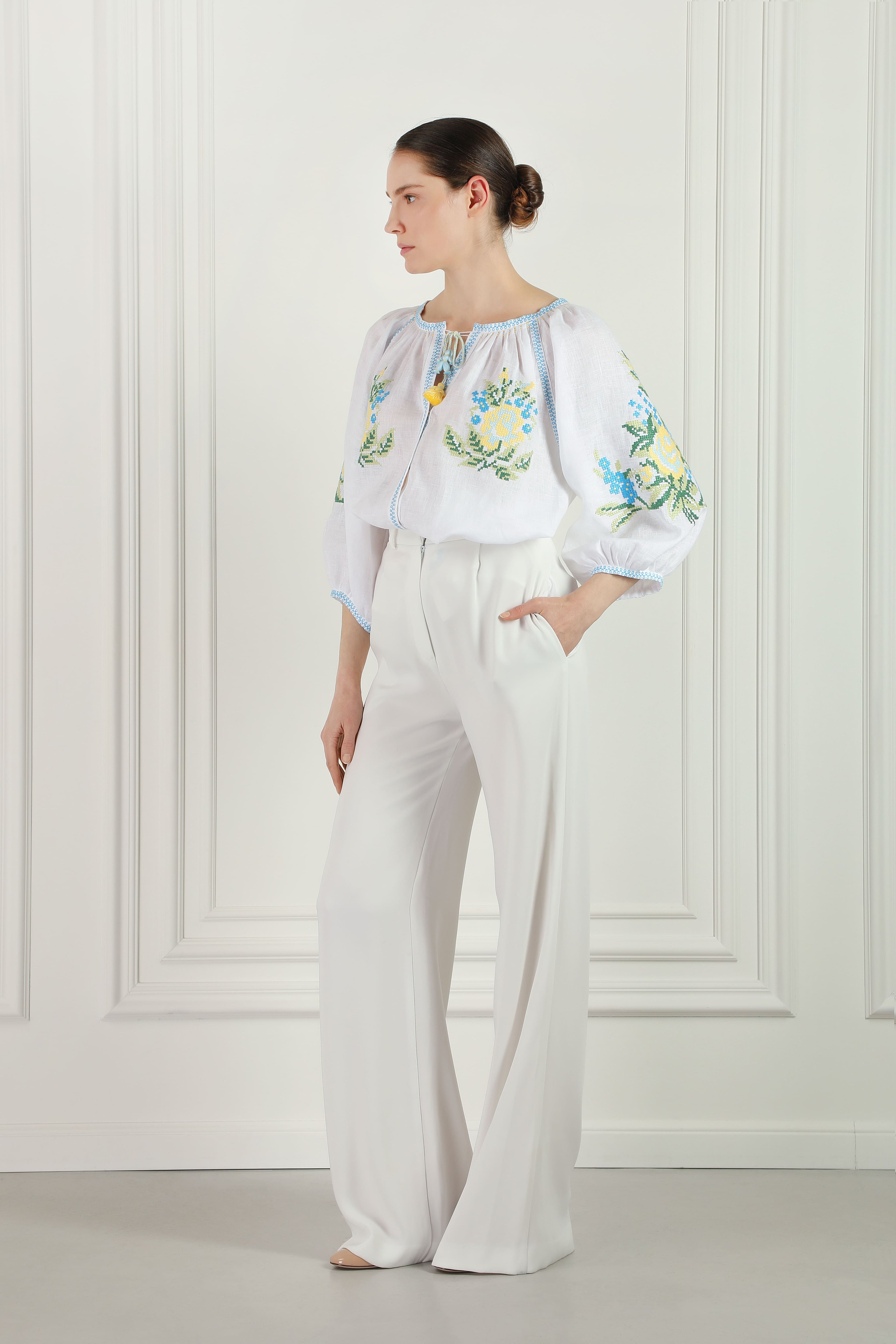 Embroidered white linen blouse with floral cross-stitch Evelyn