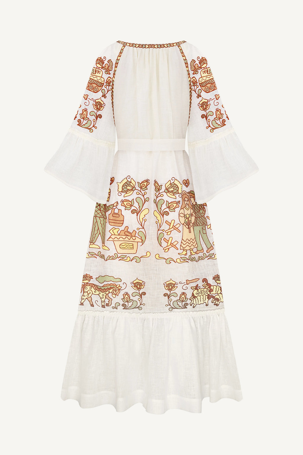 White dress with intricate orange and green embroidery on a white background