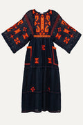 Black dress with orange geometric patterns on a white background
