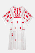 White dress with red geometric patterns on a white background