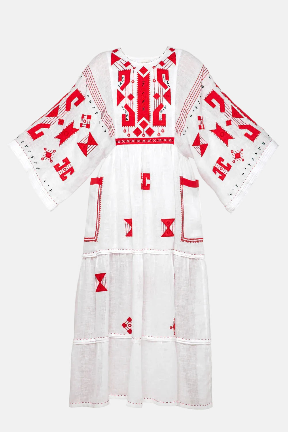 White dress with red geometric patterns on a white background