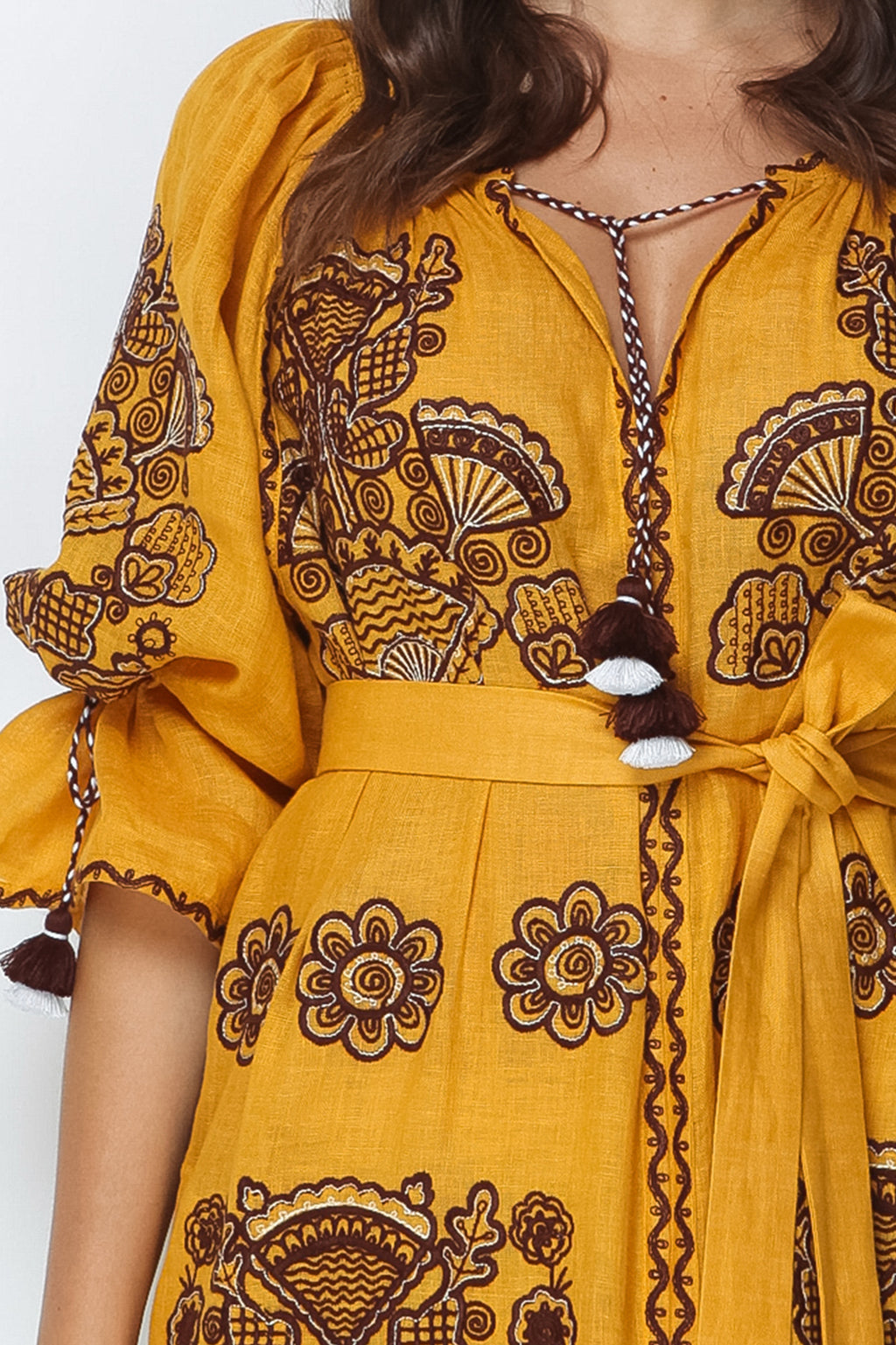 Model wearing Foberini Victory Chic mustard linen maxi dress with matching belt