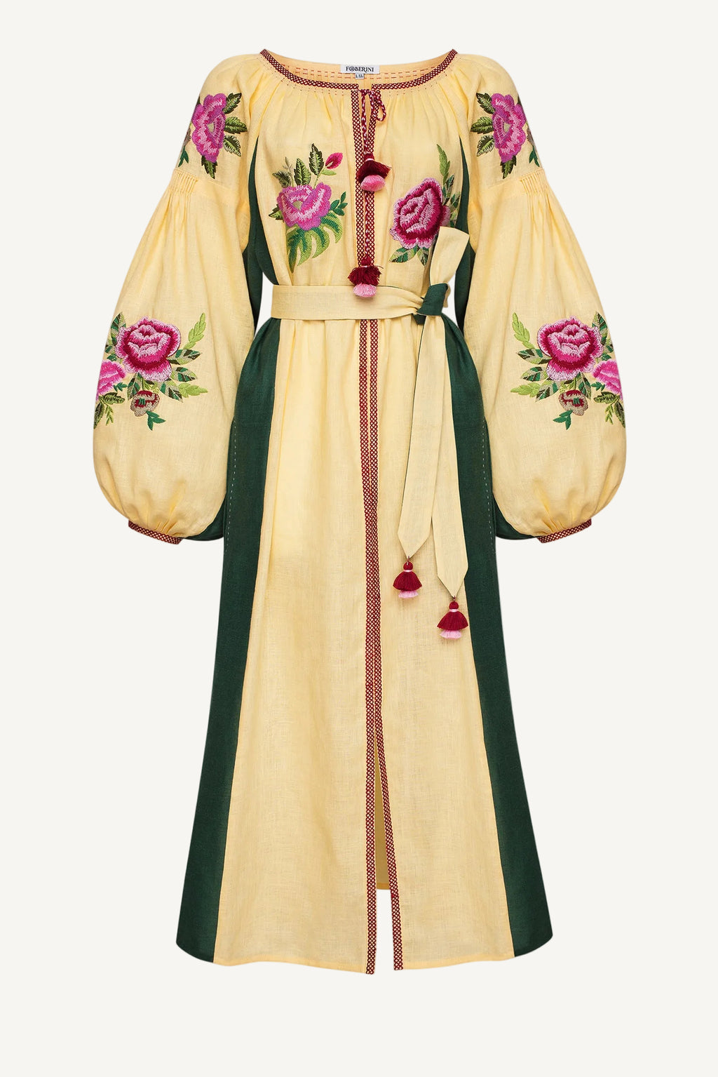 A long cream-colored dress with dark green side panels, featuring pink rose floral embroidery on the bodice and sleeves, and red tassels Blouse Roumaine Shop