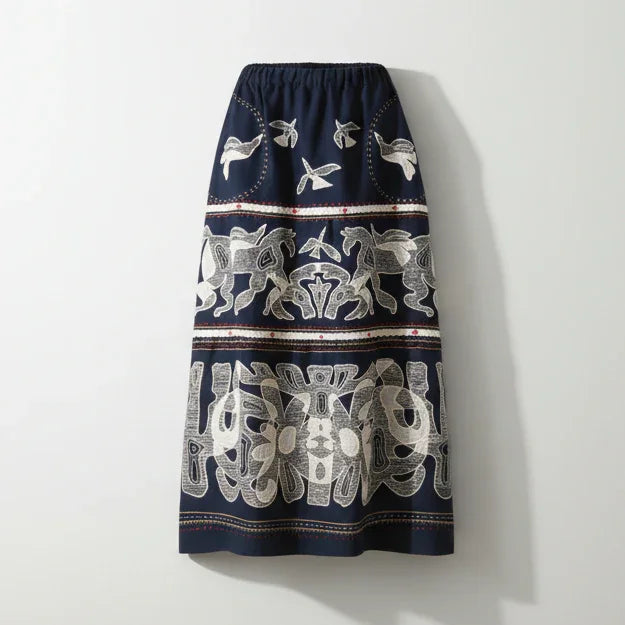 Navy blue skirt with white floral pattern on a white background