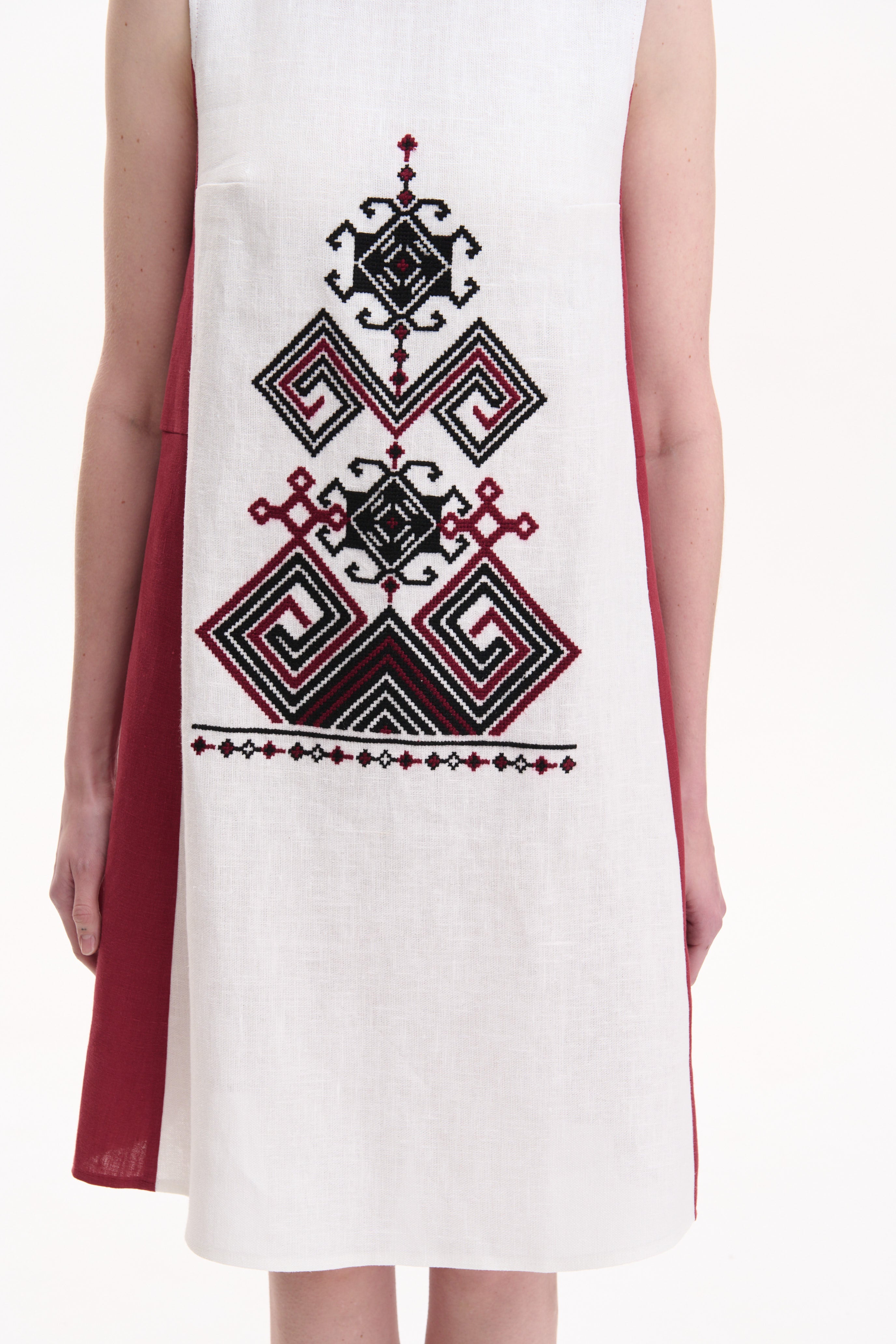 White dress with red and black geometric patterns koza dereza