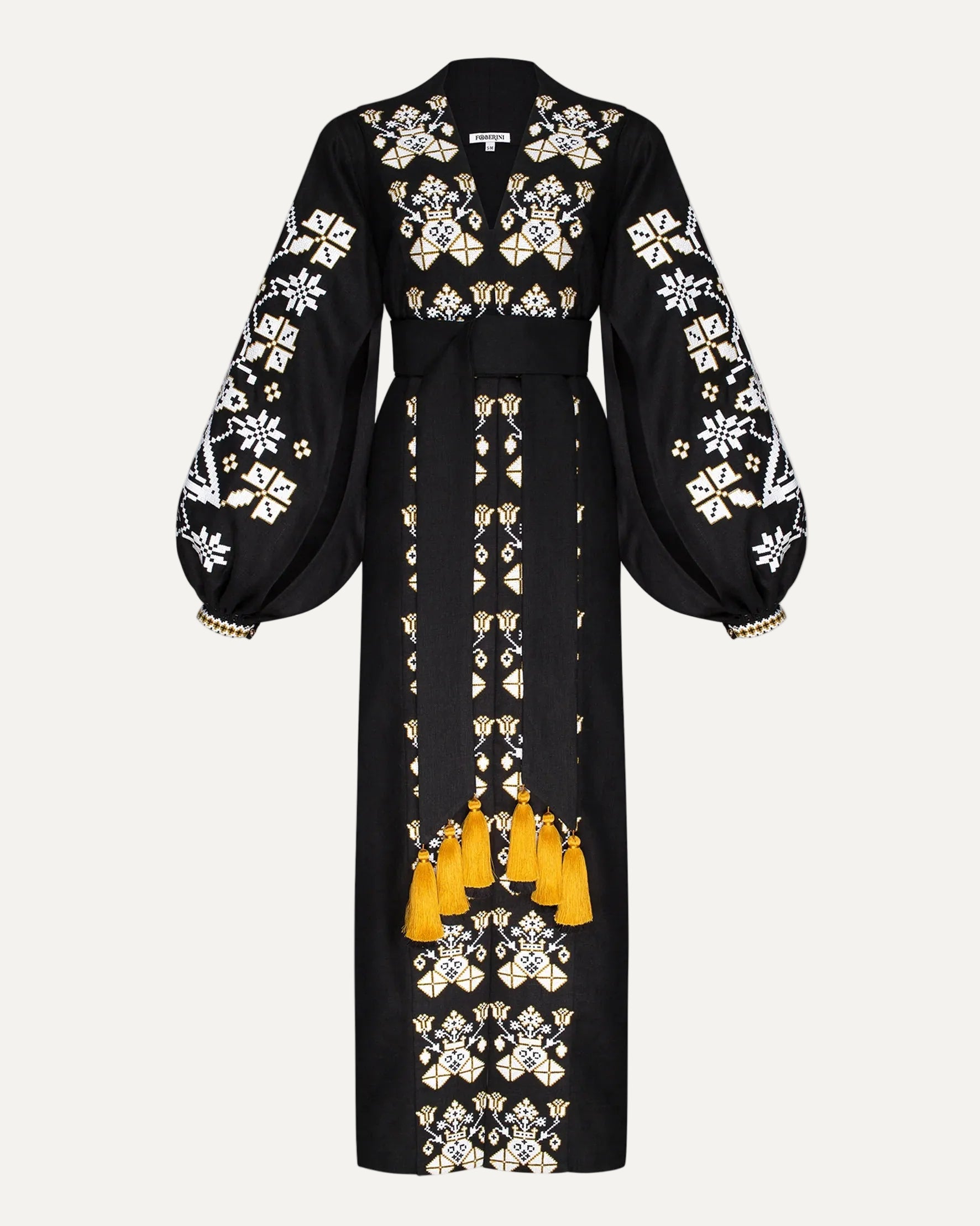 Black dress with white floral embroidery and yellow accents on a white background
