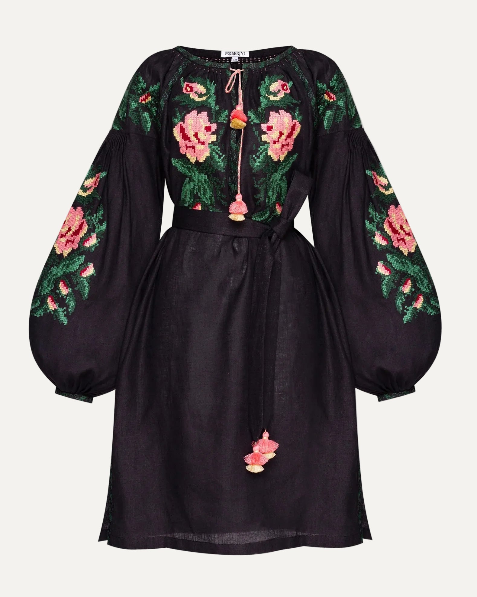 Black dress with floral embroidery on a white background