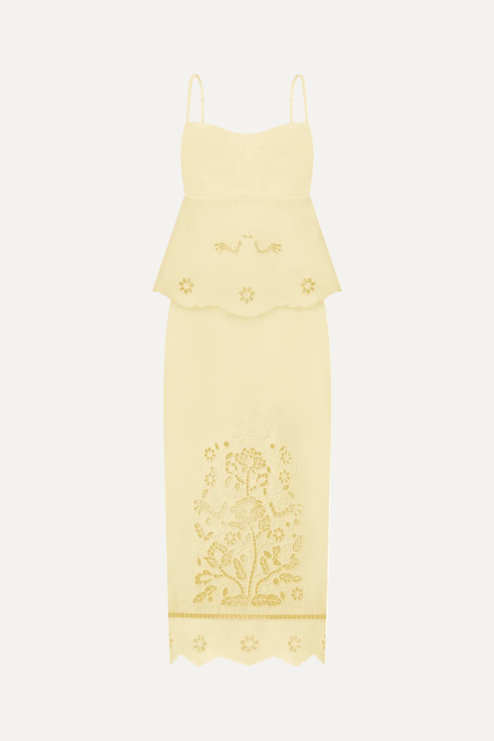 Yellow dress with floral embroidery on a white background