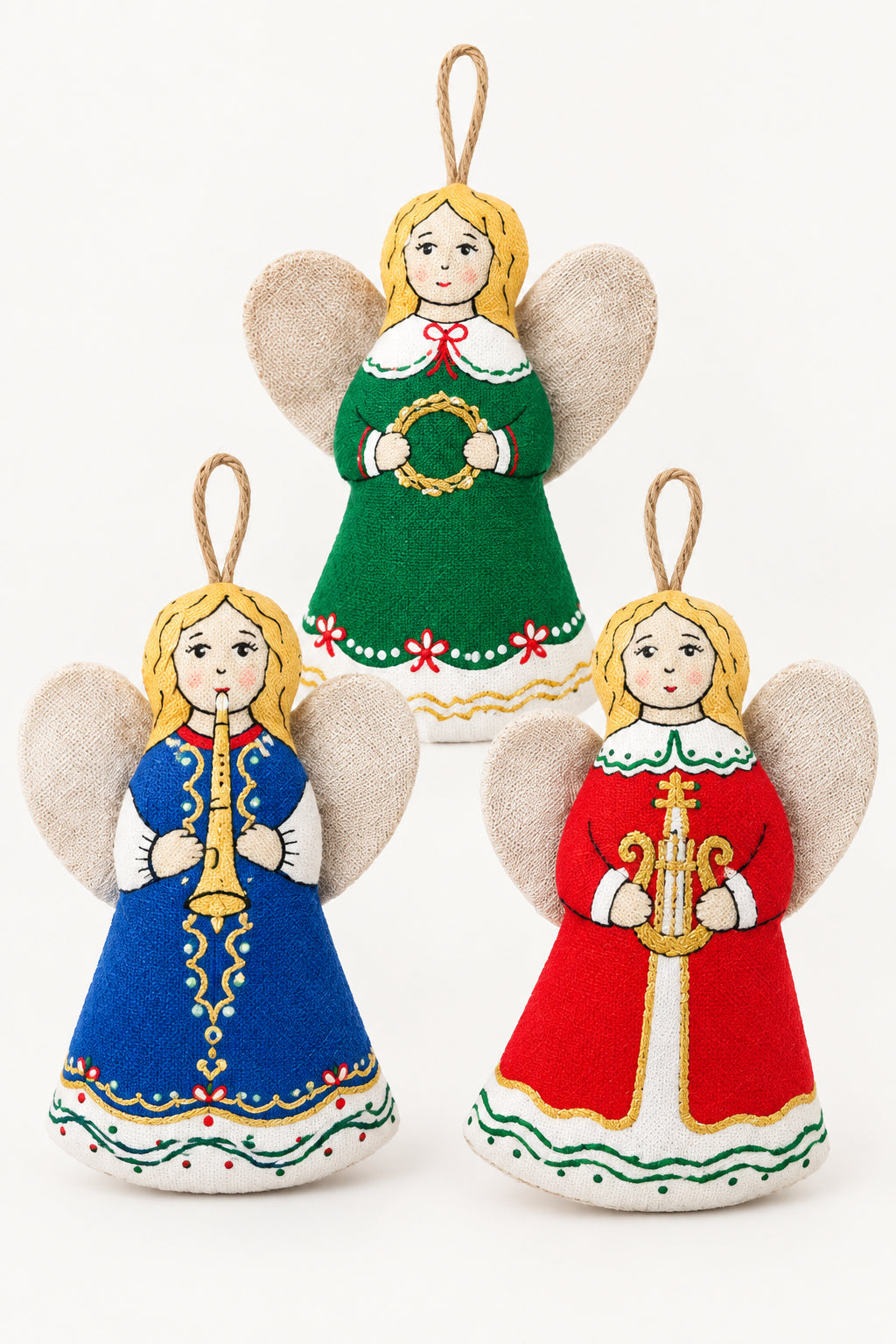 Three embroidered Christmas angel ornaments with fabric wings. Folkloric Christmas