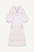 White dress with intricate embroidery on a white background