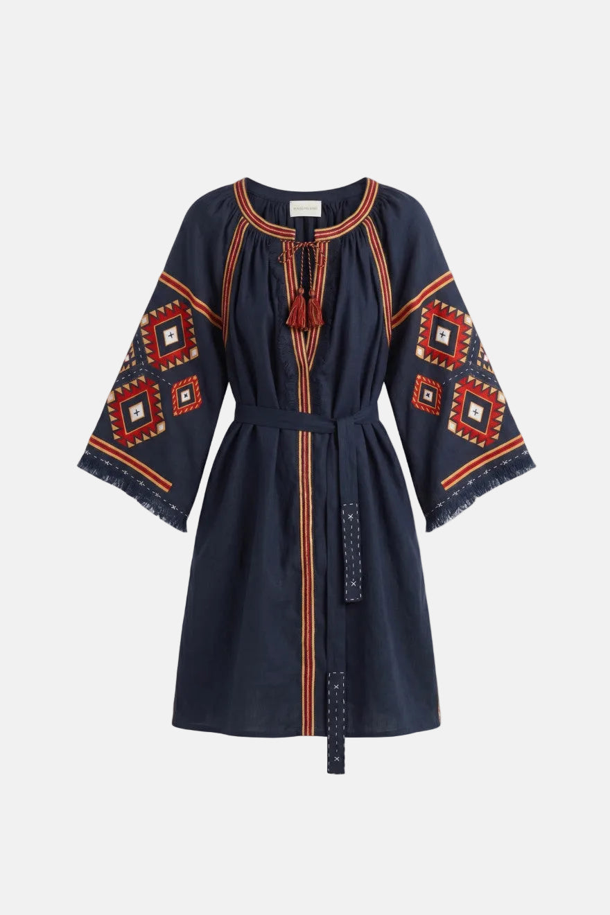Navy dress with red and orange geometric patterns on a white background