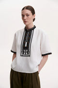 Blouse Roumaine Shop - Vyshyvnka Embroidered Collection, traditional short-sleeve blouse with black embroidered trim around the neckline and sleeve cuffs Vyshyvanka Embroidered Blouse