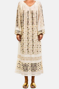 Long, patterned dress worn by a person on a white background