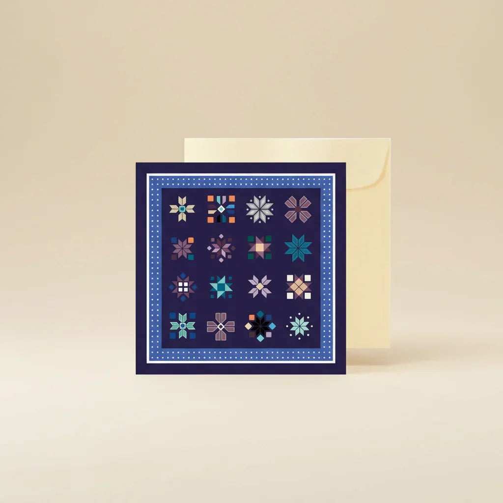 Card with geometric pattern and envelope on a white background