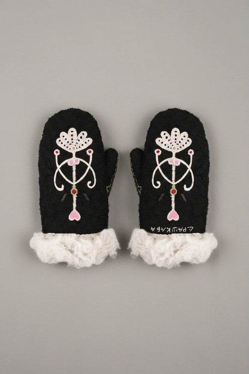 Black mittens with floral design and white lace trim on a white background
